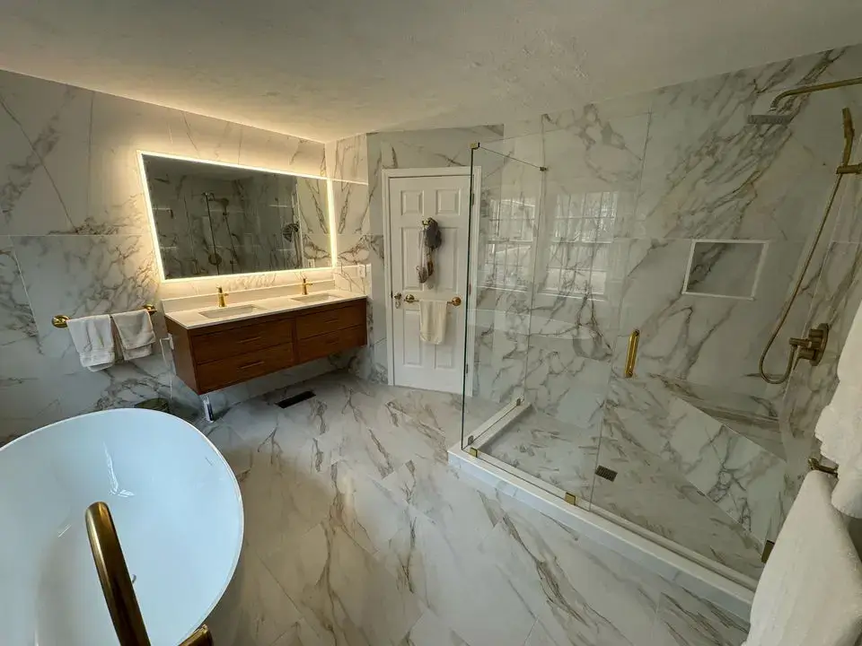 Marble bathroom remodel by Skills Renovation in MetroWest Massachusetts